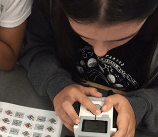 student using a calculator